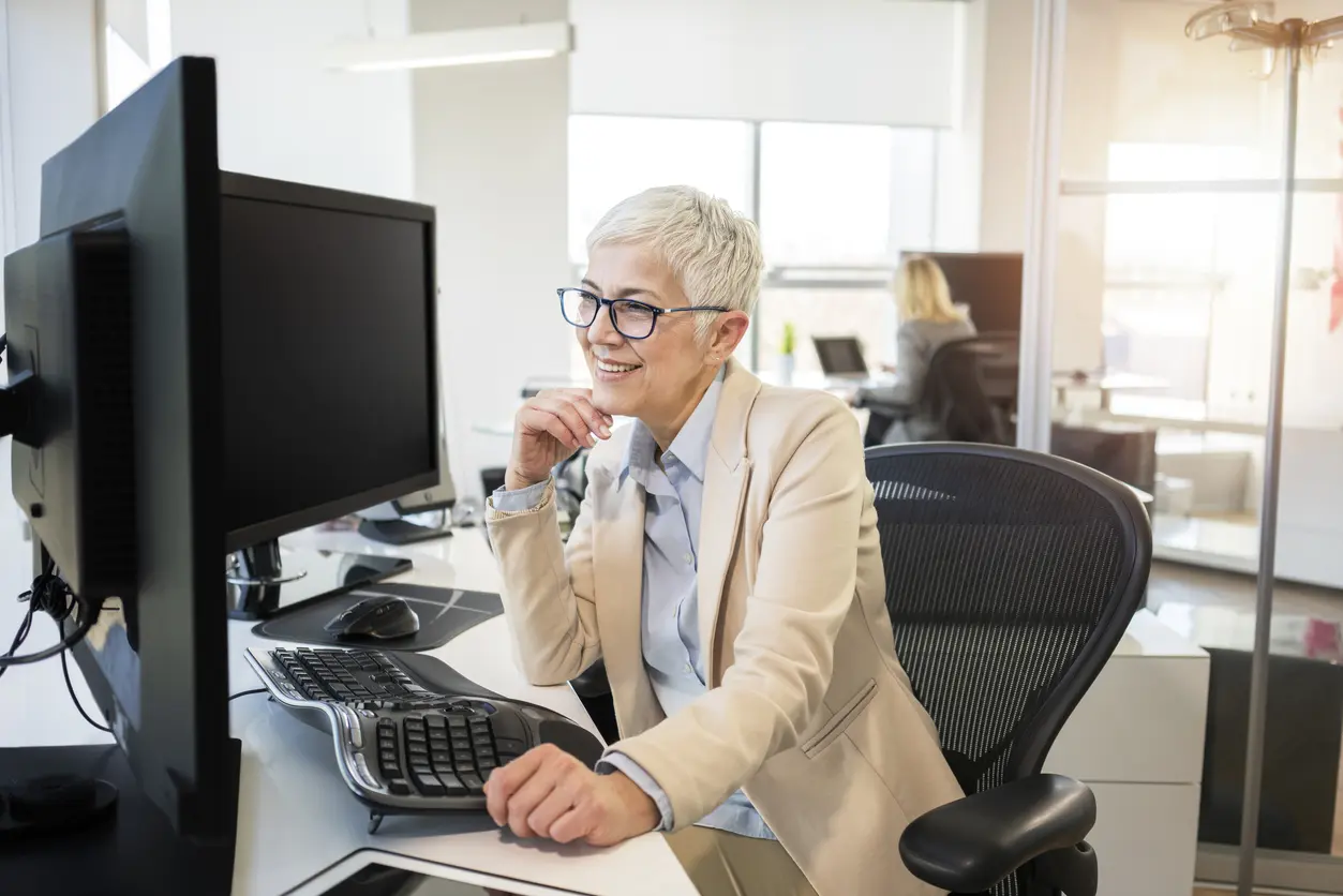 Mature business women working at the office